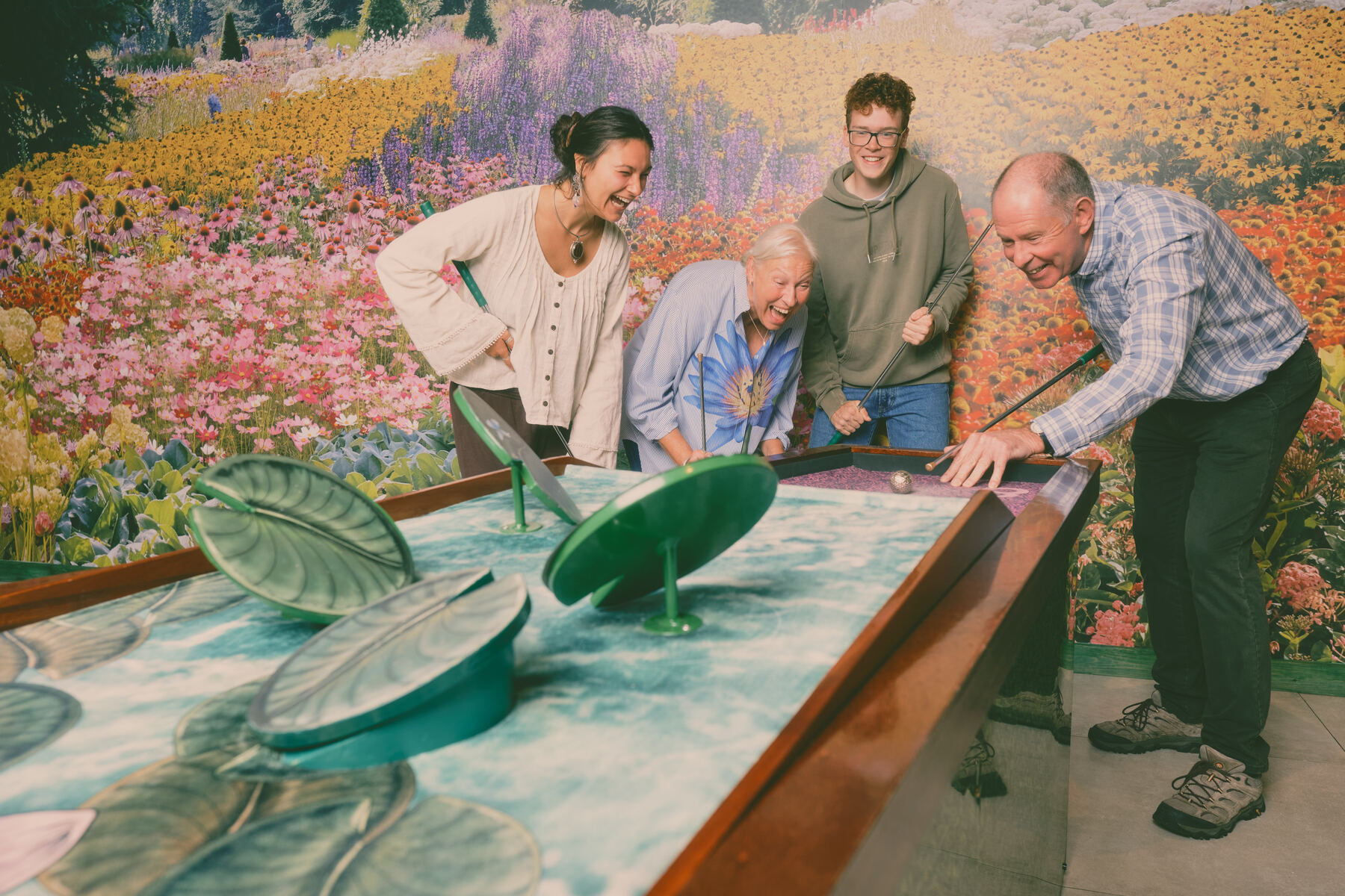 Hole 08 — The Lily Pads — Carol, Charlie, Guy and Jorien celebrating